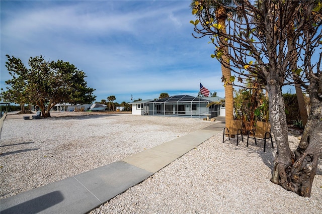 view of front of property with a lanai