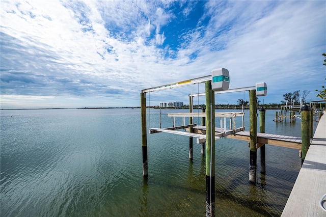 view of dock with a water view