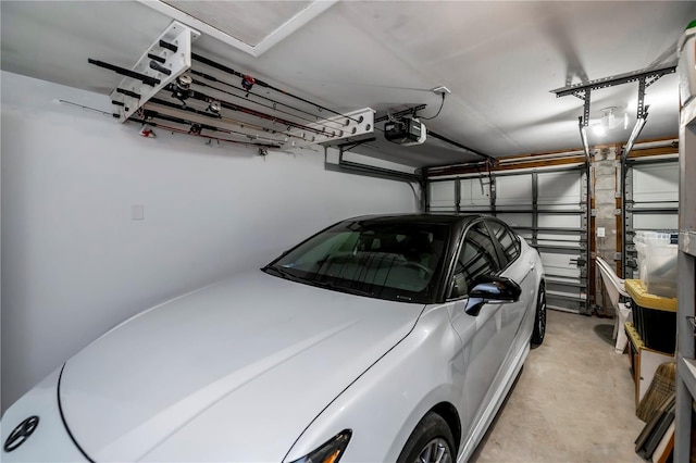 garage featuring a garage door opener