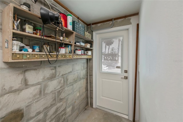 doorway featuring concrete floors