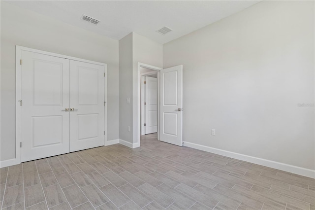 unfurnished bedroom featuring a closet