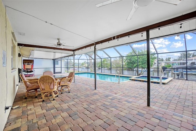 view of swimming pool featuring ceiling fan