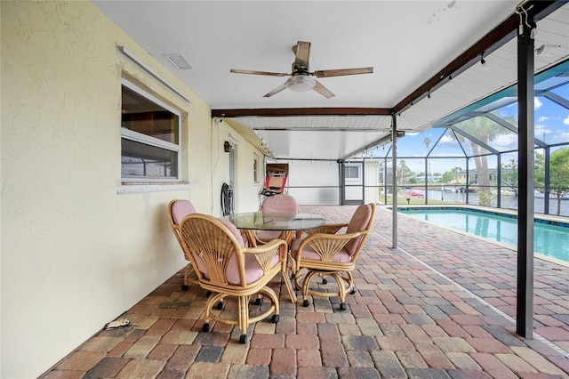 interior space with ceiling fan and a swimming pool