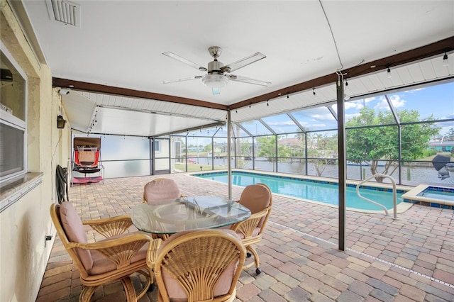 view of pool featuring ceiling fan