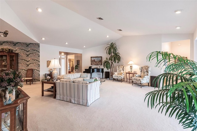 living room featuring light carpet and lofted ceiling