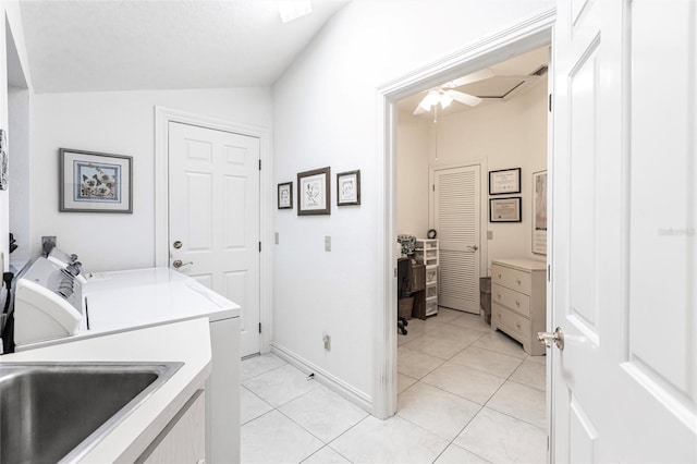 washroom featuring ceiling fan, independent washer and dryer, a textured ceiling, and light tile patterned floors