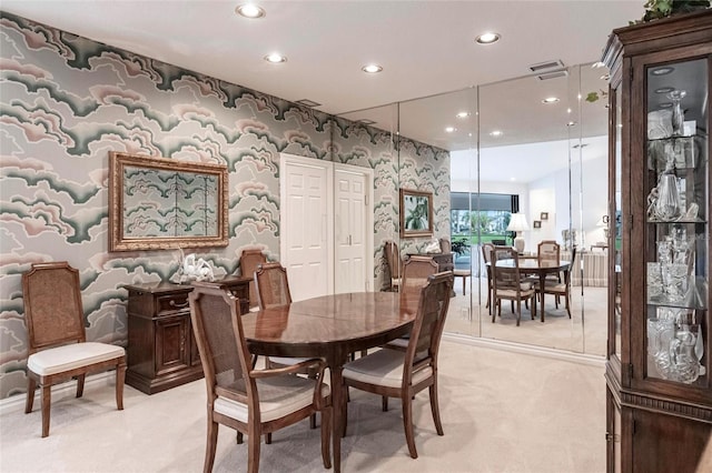 view of carpeted dining area