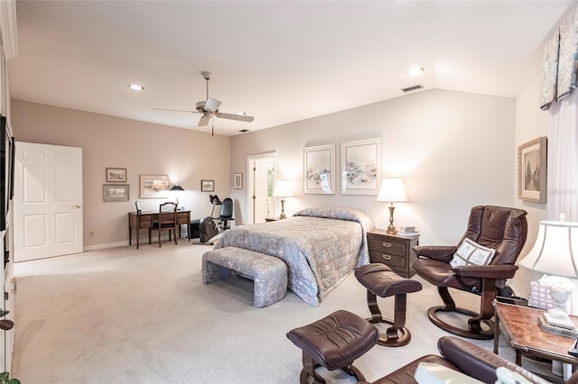 bedroom featuring light carpet, vaulted ceiling, and ceiling fan