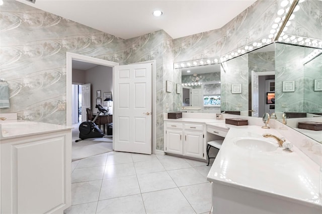 bathroom with vanity, tile patterned floors, and tile walls