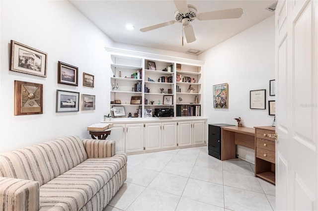 office featuring light tile patterned floors and ceiling fan