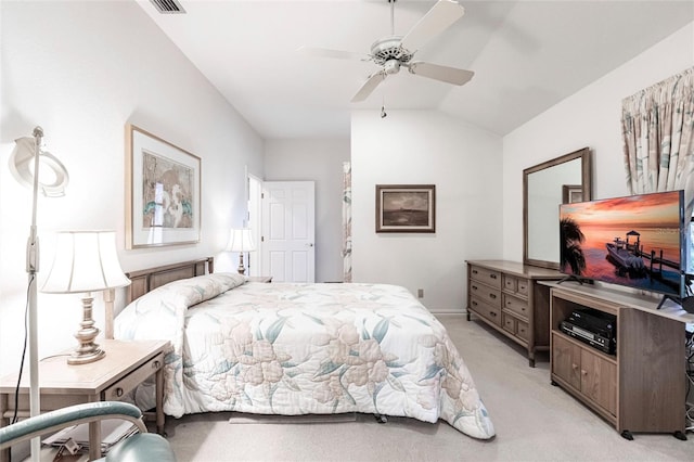 carpeted bedroom featuring ceiling fan and lofted ceiling