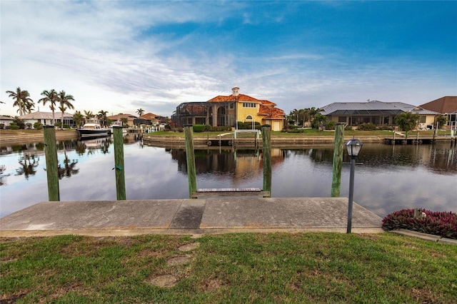 dock area with a water view