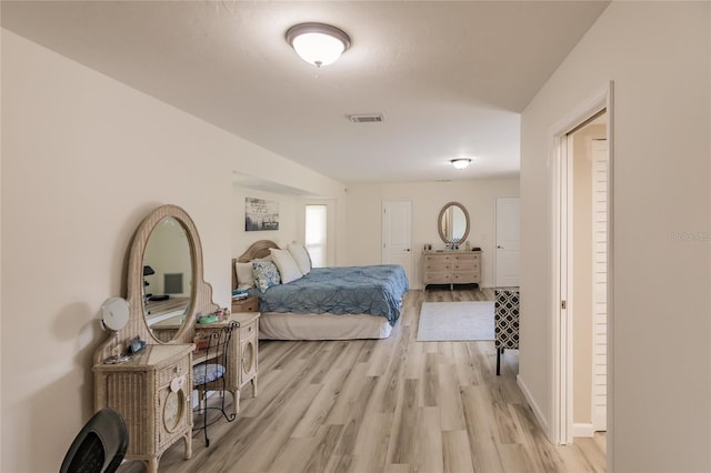 bedroom with light hardwood / wood-style floors