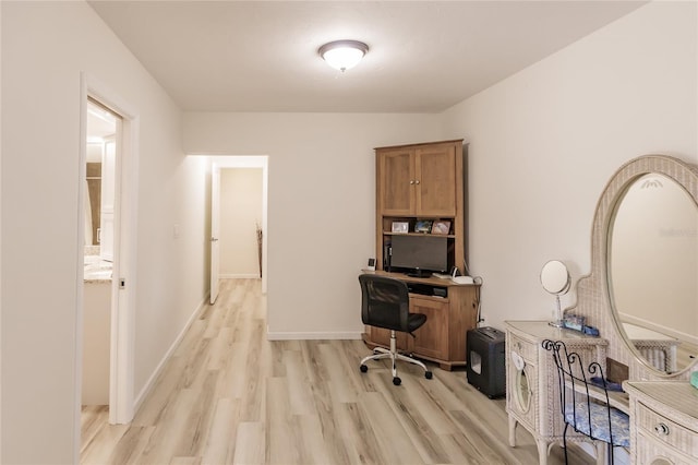 office space with light hardwood / wood-style floors