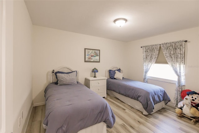 bedroom featuring light hardwood / wood-style flooring