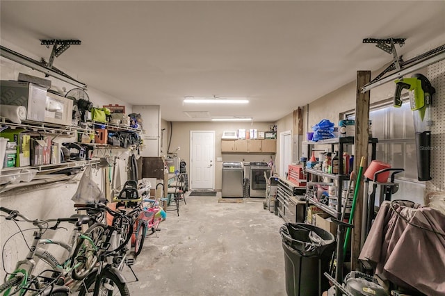 interior space with washing machine and clothes dryer