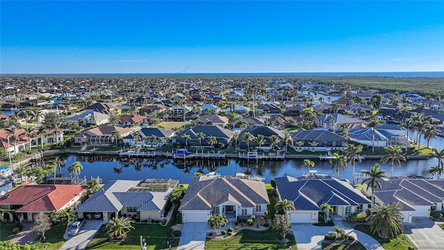 drone / aerial view with a water view