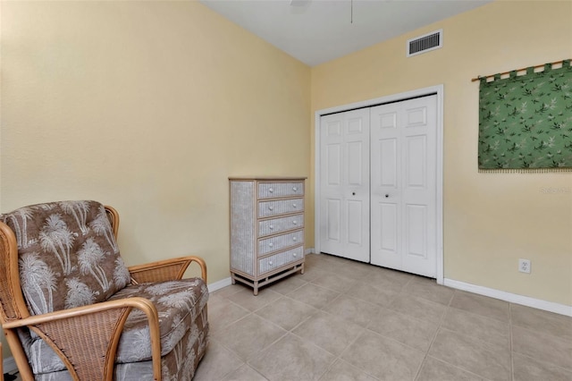 sitting room with light tile patterned flooring