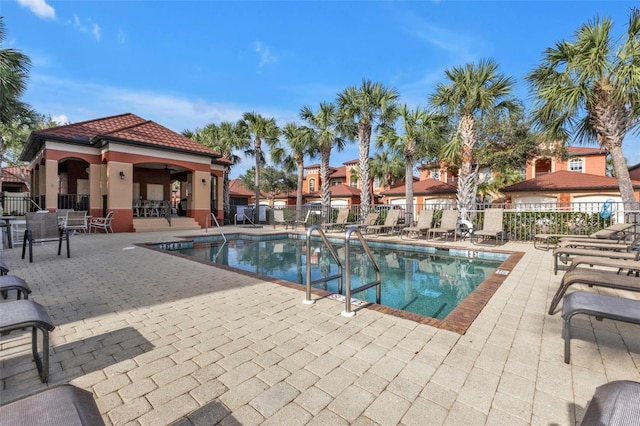 view of swimming pool featuring a patio