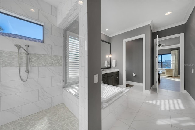 bathroom with vanity, tiled shower, a wealth of natural light, and ornamental molding