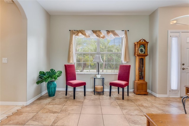 sitting room with light tile patterned floors