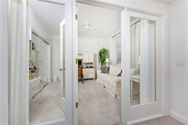 interior space featuring french doors and ceiling fan