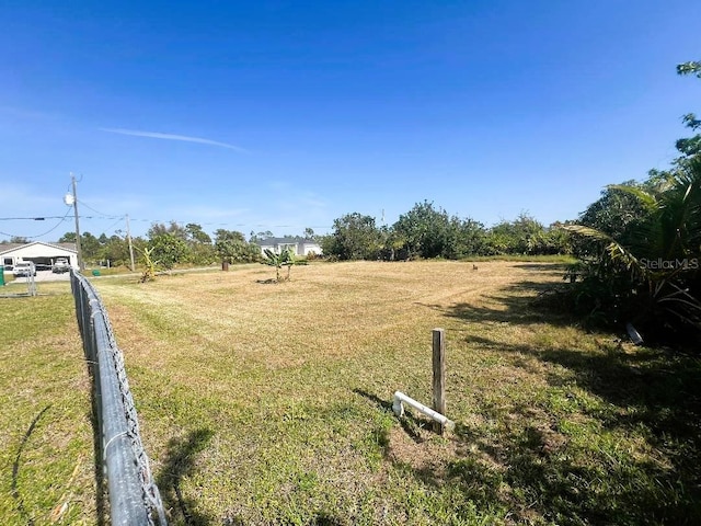 view of yard with fence