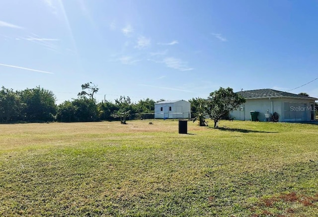 view of yard featuring a garage