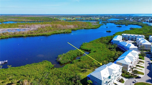 bird's eye view with a water view