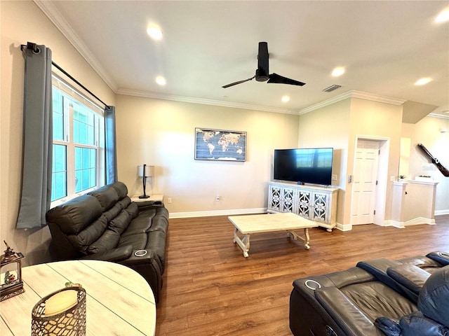 living room featuring wood-type flooring, ceiling fan, and ornamental molding