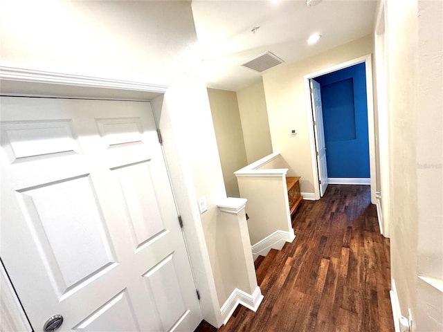 hall featuring dark wood-type flooring