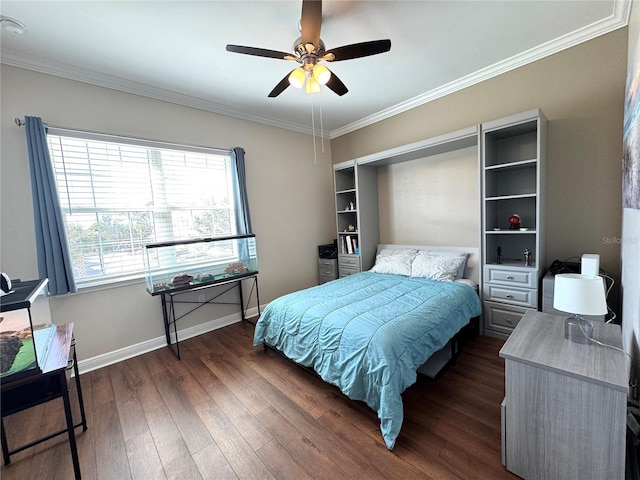 bedroom featuring dark hardwood / wood-style floors, ceiling fan, and crown molding