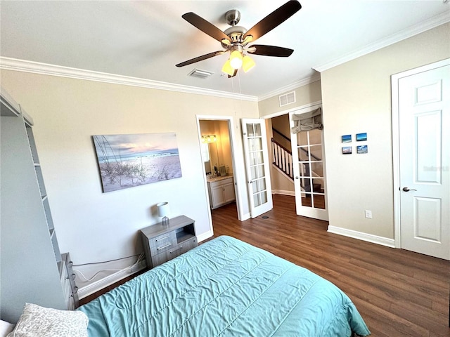 bedroom with ensuite bath, ceiling fan, french doors, dark wood-type flooring, and crown molding