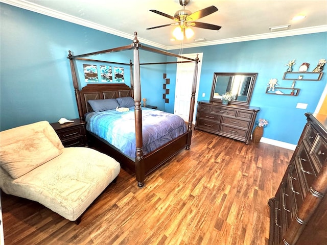 bedroom with ceiling fan, hardwood / wood-style floors, and ornamental molding