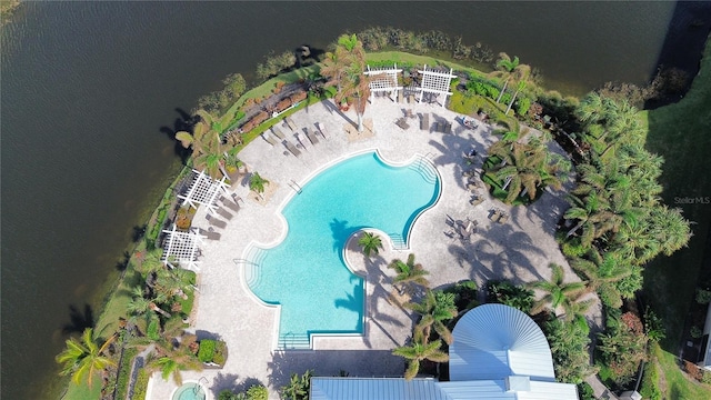 birds eye view of property featuring a water view