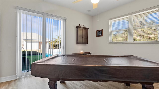 game room with ceiling fan, pool table, and light hardwood / wood-style floors