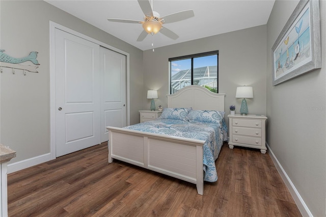 bedroom featuring ceiling fan, a closet, and dark hardwood / wood-style floors