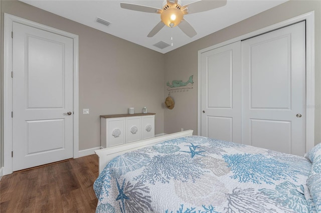 bedroom with ceiling fan, a closet, and dark hardwood / wood-style flooring