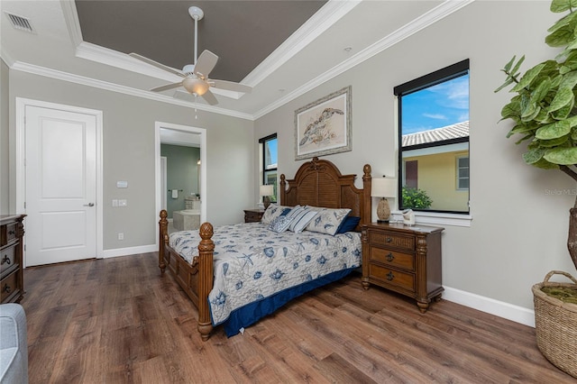 bedroom featuring ceiling fan, dark wood-type flooring, and ornamental molding