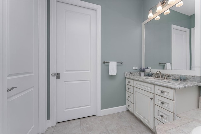 bathroom featuring vanity and tile patterned flooring