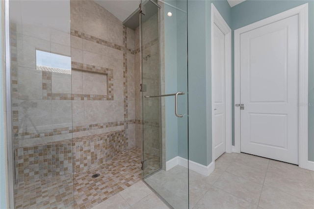 bathroom featuring tile patterned floors and walk in shower