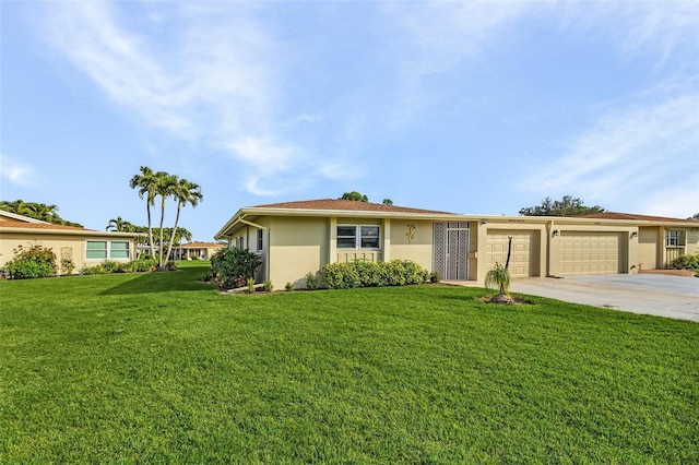 single story home with a front yard and a garage