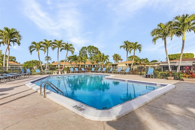 view of swimming pool featuring a patio