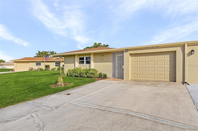 ranch-style house with a front lawn and a garage