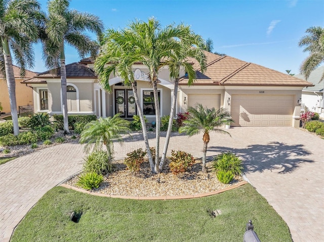 view of front of property with a garage