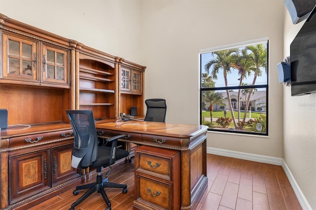 home office featuring hardwood / wood-style floors