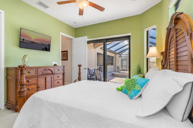 bedroom featuring access to outside, ceiling fan, and carpet floors