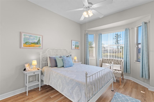 228 Nicholas Pkwy E, Cape Coral, FL 33990 - bedroom featuring baseboards, a ceiling fan, and wood finished floors