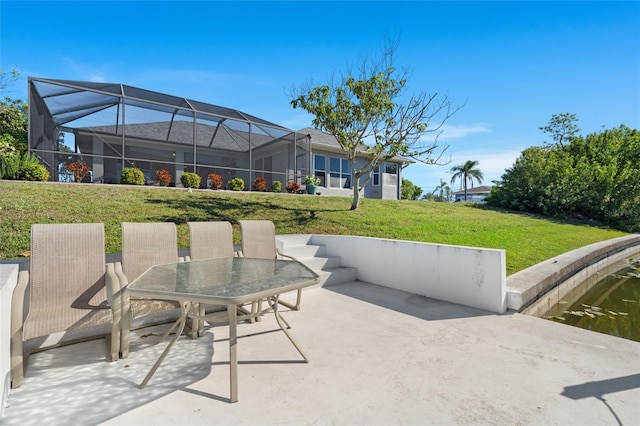228 Nicholas Pkwy E, Cape Coral, FL 33990 - view of patio / terrace featuring glass enclosure and outdoor dining space
