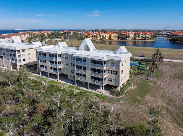 drone / aerial view with a water view